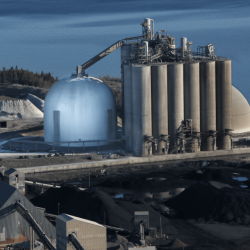 St. Marys Cement domes in Charlevoix with port in the background.